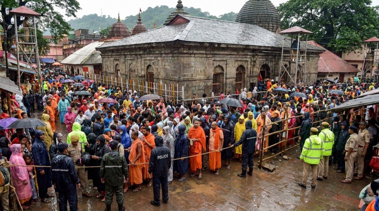 Devotees gather at Kamakhya Temple in Guwahati, Assam, during the annual Ambubachi Mela amid heavy crowd-management arrangements.