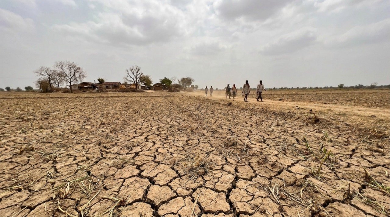 Dry cracked farmland awaiting monsoon rain, illustrating India's farm contingency mapping amid a rain deficit