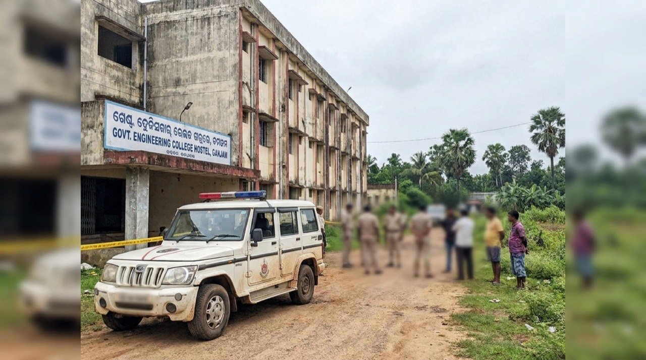Police vehicle outside a college hostel in Ganjam district, Odisha, where an engineering student was found dead