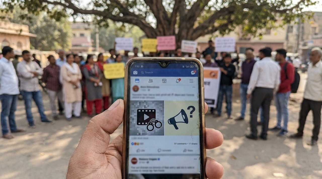 Smartphone showing a social media app, illustrating the Rajasthan Instagram video detention free-speech debate