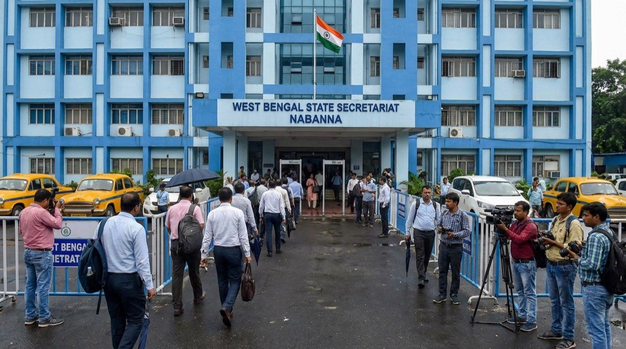 West Bengal state secretariat building with administrative staff arriving for work.